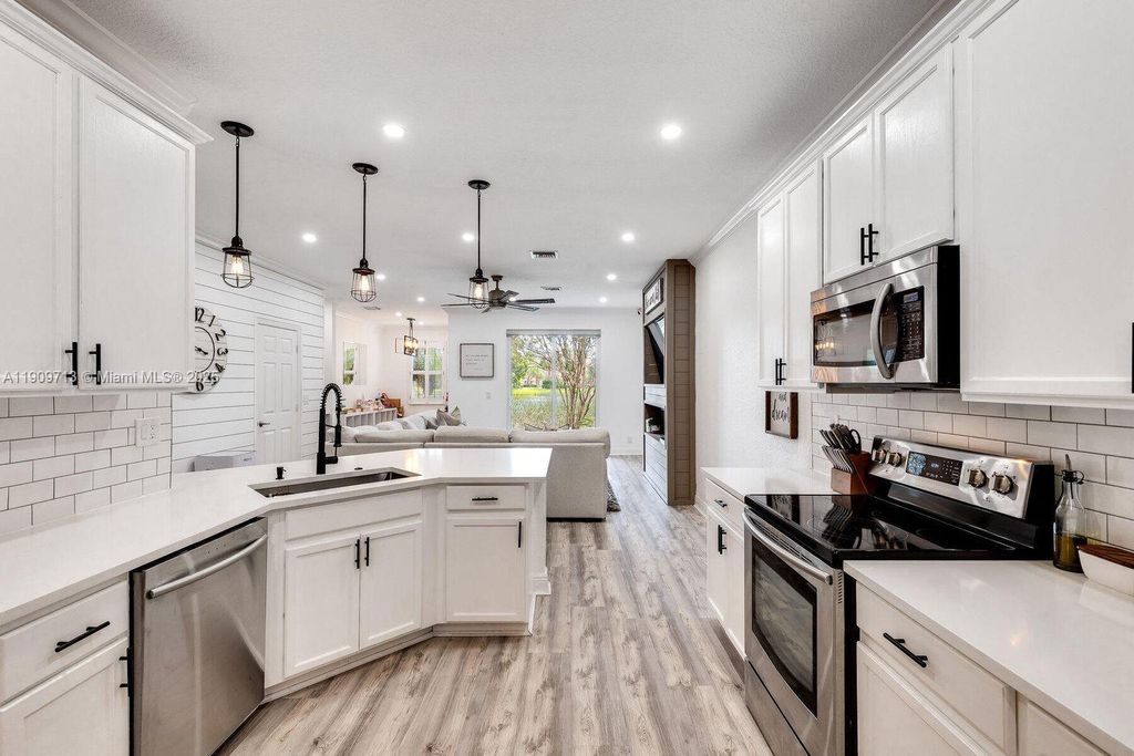 Photo of 4890 Bonsai Cir #106, Palm Beach Gardens, FL 33418 (MLS # A11909713)