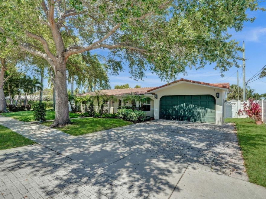 Fall in love with this beautifully maintained, move-in-ready 3-bedroom, 2-bath home located in one of Lighthouse Point’s most desirable communities! Perfectly placed on a fully fenced corner lot, this residence offers timeless appeal & charm. Features include: Spacious living areas with elegant plantation shutters, gorgeous kitchen with stainless steel appliances, custom wood cabinetry, granite countertops, & abundant storage, luxurious primary suite with a large sitting area, oversized walk-in closet, & spa-like bathroom featuring a rain shower & soothing body sprays, versatile Florida room perfect for a home office, gym, or playroom, covered back porch & generously sized yard—ideal for pets or playtime, 2-car garage, Hurricane impact windows for added security & peace of mind. No HOA!