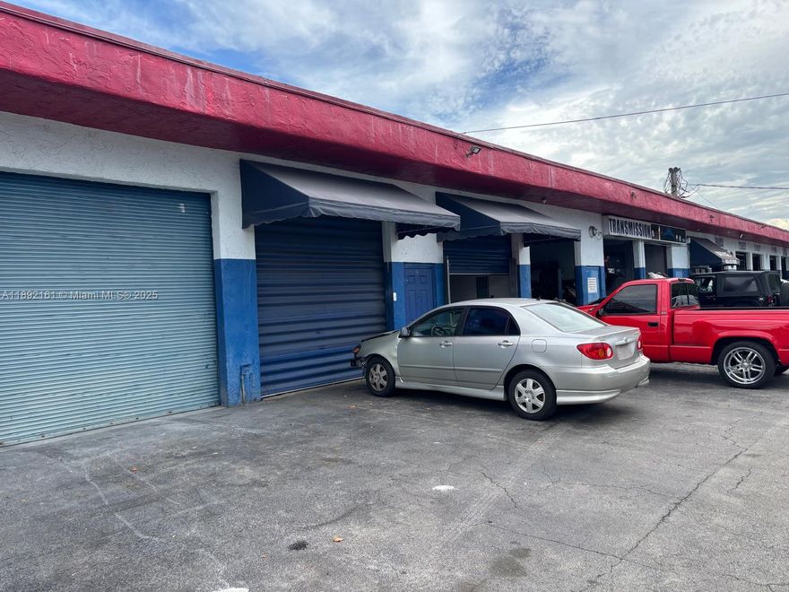 Prime, high-demand auto service plaza—rare leasing opportunity in a thriving business center with steady tenants and high traffic. Current tenants include mufflers, transmissions, general mechanics, tires and more, so you benefit from constant customer flow. Just behind?441 and one block south of Atlantic?Blvd, with easy access to I-95/Florida’s Turnpike. 1?110?sq?ft total: approx. 300?sq?ft office with kitchenette and full bathroom with shower, plus a 12-ft-clear workshop/warehouse. Two 10×10 overhead doors. Ideal for automotive-related businesses, light storage or compatible services. Owner is motivated—open to offers and will consider one free month to offset installation costs. Don’t miss out on this coveted spot!
