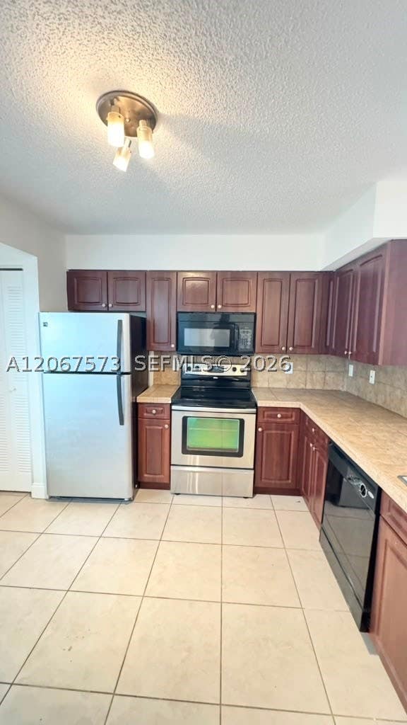 Photo of 1701 Village Blvd #111, West Palm Beach, FL 33409 (MLS # A12067573)