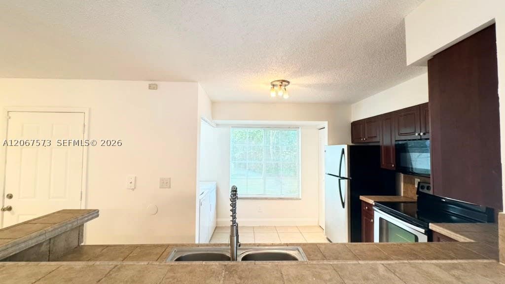 Photo of 1701 Village Blvd #111, West Palm Beach, FL 33409 (MLS # A12067573)