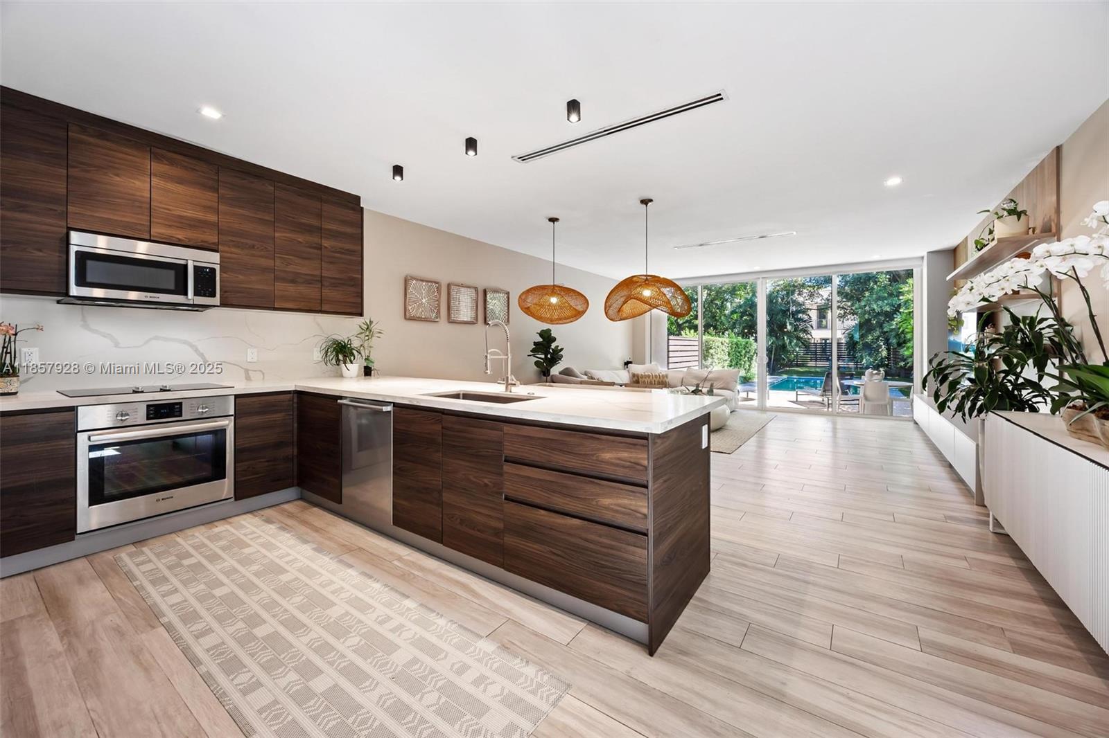 Located on one of the largest single lot in the neighborhood, this 2020-built Coconut Grove townhouse offers 2,126 sq ft of stylish living space with 3 bedrooms and 3.5 baths. Bright, open interiors flow seamlessly to a private backyard with a sparkling pool. A gated entry, garage, and driveway add convenience, while cafés, markets, restaurants, parks, and the Bay are all just a short stroll away.