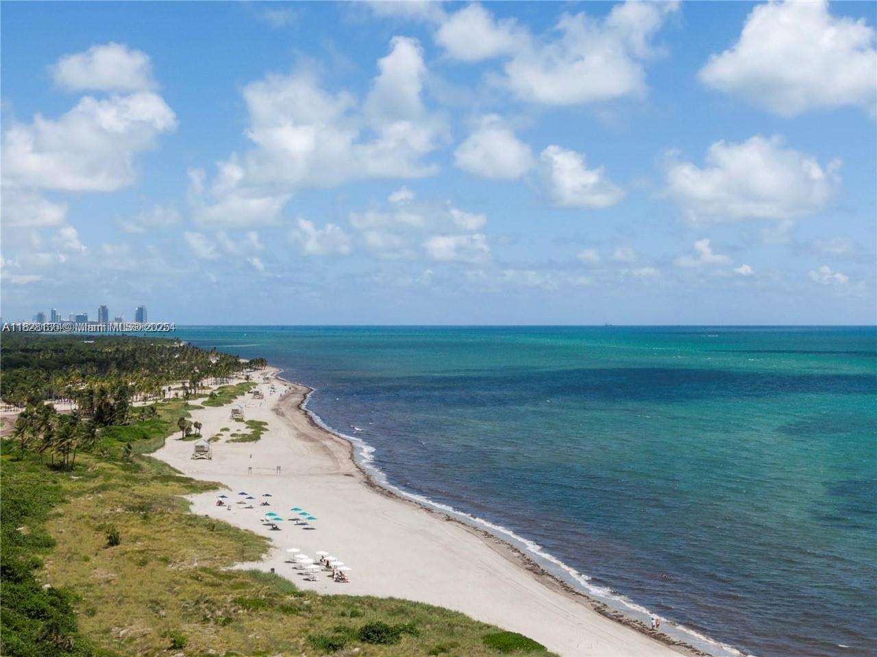 Breathtaking ocean and bay views in this fantastic 2 bedrooms - 2 bathrooms + Den. Tile floors throughout, balcony with great views, huge storage and breakfast area. Enjoy this resort style complex with private beach, Tiki Bar and restaurant, tennis courts, swimming pools, fitness center, party room and play ground. Unit is vacant and easy to show via Show Assist.