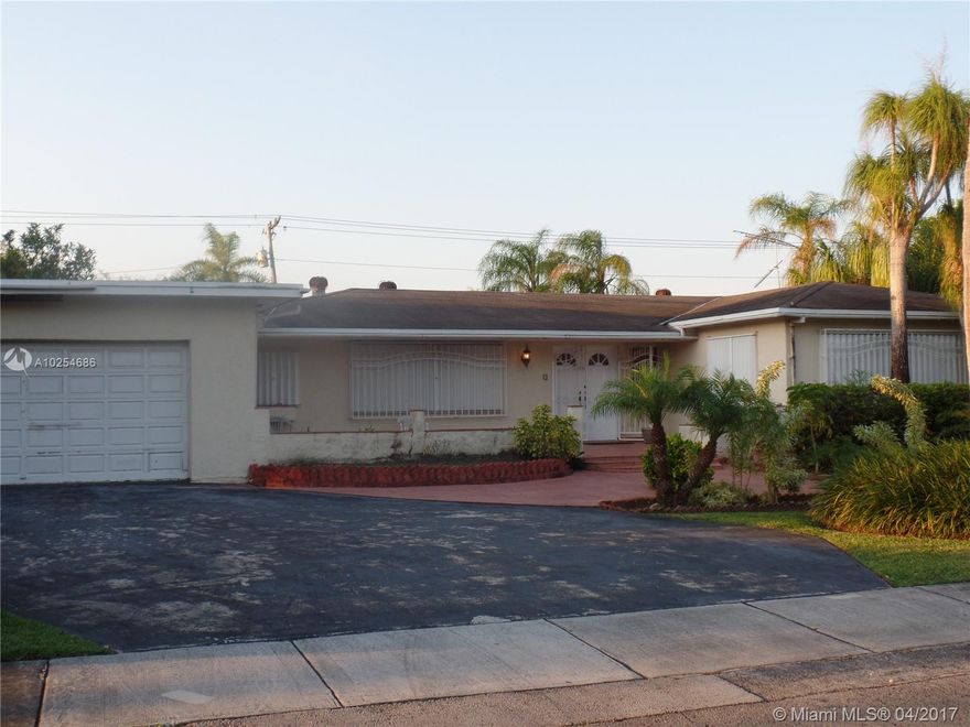 Location! Location! This home sits on a cul-de-sac with a huge lot. Pool, fruit trees, accordion shutters. Garage is converted to a 6th bedroom and can be easily converted back. This home has lots of potential.