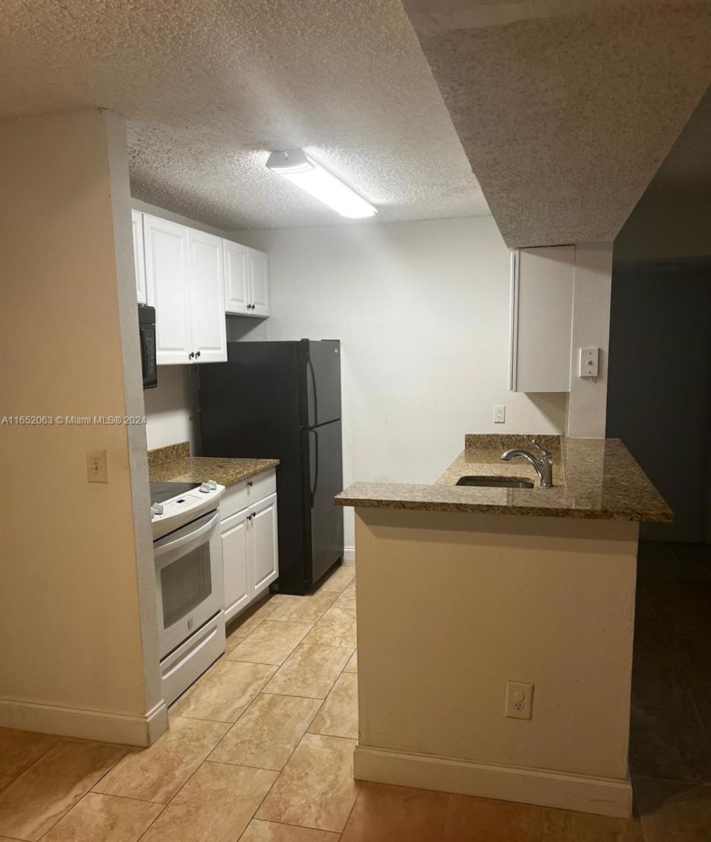 Photo of Pompano Beach, FL 33069 (MLS # A11652063)