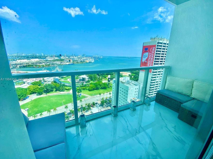 Experience refined luxury in this one-of-a-kind, expansive corner residence at the prestigious Vizcayne South Tower. Spanning 1,258 sq ft (per floor plan), this exceptional 2-bedroom, 2-bath home offers breathtaking, unobstructed views of Biscayne Bay and Bayfront Park from every room, perfectly positioned in the heart of Downtown Miami.

Completely renovated in August 2021, this bespoke residence showcases the finest finishes, including premium Spanish marble flooring, a custom marble entertainment feature, and a sleek Italian-designed kitchen with glossy white cabinetry and state-of-the-art smart stainless steel appliances. Both bathrooms are elegantly appointed with marble floors and glass-enclosed showers, while two oversized custom walk-in closets and recessed lighting throughout complete the sophisticated design.

Residents enjoy an elevated lifestyle with resort-style amenities, including four tropical pools, three jacuzzis, a full-service spa with sauna and steam rooms, a cutting-edge fitness center with daily classes, and 24-hour concierge and security services. Includes one assigned covered parking space.