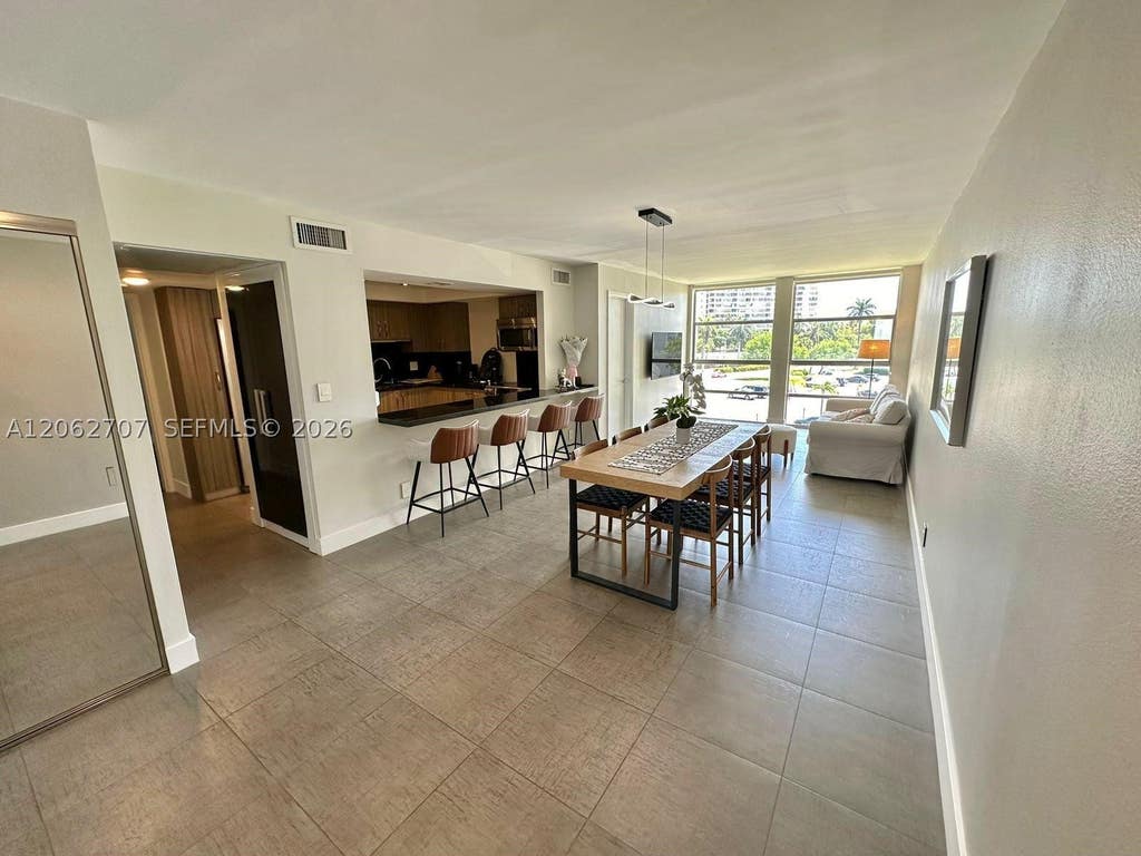 Photo of 801 Three Islands Blvd #412, Hallandale Beach, FL 33009 (MLS # A12062707)