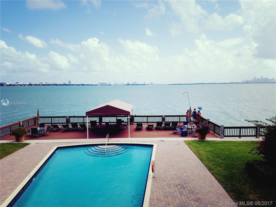 View Plus Location - AMAZING VIEW OF MIAMI - 2/2 with a fantastic view from of popular Treasures on the Bay.  Tile floors, ALL windows, and doors HAVE A VIEW ON THE BAY and great amenities right here on a quiet Biscayne Bay setting. Huge gym, 3 pools, convenience store right here in the community. PRIVATE BOARDWALK right on the bay as well, on the southeastern tip of Treasure Island.