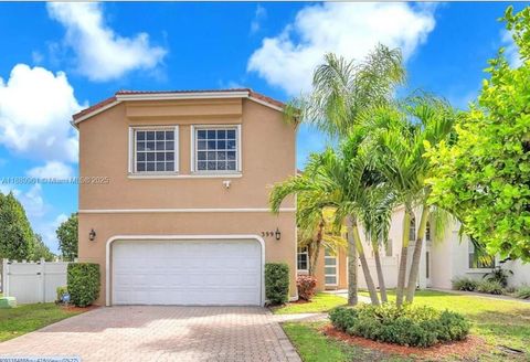 Photo of 399 NW 154th Ave, Pembroke Pines, FL 33028 (MLS # A11889961)