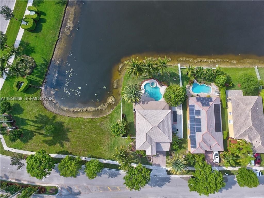 Photo of 14300 NW 16th St #14300, Pembroke Pines, FL 33028 (MLS # A11957269)