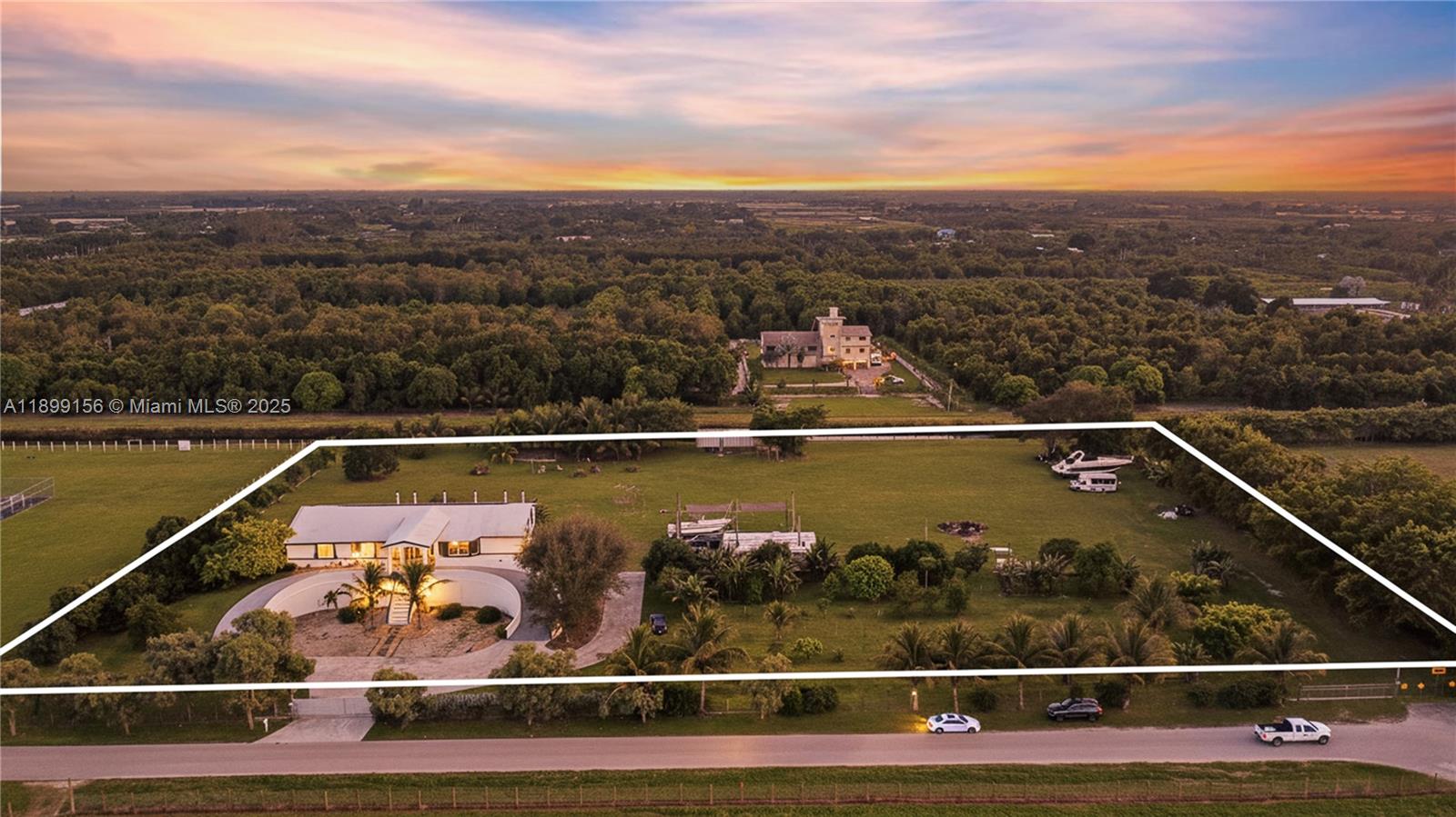 STOP THE SCROLL, THIS IS IT! Stunning 2019-built ranch estate on nearly 4 acres in the highly sought-after Redlands! This 6BR/6BA luxury home offers over 11,000 sq ft of living space with a circular driveway entrance & high-end finishes throughout. Designed for sustainability & privacy, the property features 60 solar panels with a 20KW InPhase battery backup, EV charging stations & fertile land with mature mango, papaya & carambola trees. Enjoy a concrete roof, PGT impact windows/doors & full hurricane-proof construction. Includes a fully built underground bunker/garage with space for up to 18–20 vehicles, wine cellar & a pool shell with piping under the deck. Horse trails & the scenic C-102 canal nearby! Lot can be divided and 2-3 homes can be built for a true multi-generational compound!