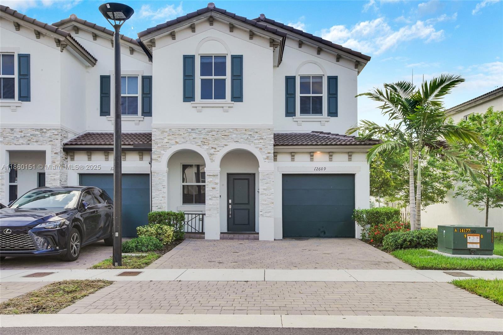 Bright and BeautiFul 3 bedrooms and 2.5 bathrooms corner townhouse with canal views. Open kitchen with steinless Steel Appliances. Samsung Washer and dryer. Ceramic titles in first floor and brand new gray carpert in second floor. Private patio and enclosed garage. Gated community with Clubhouse, swimming pool, fitness center, playground area, dog park. Easy to show and ready to move in.
