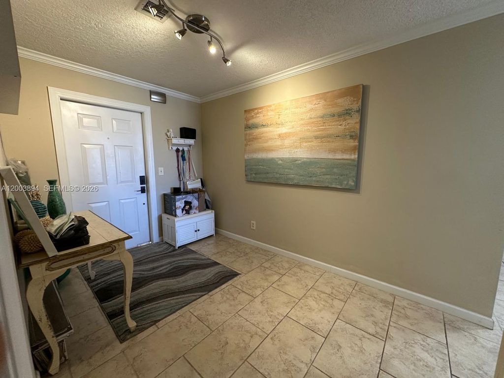 Photo of 801 Palm Trl #10, Delray Beach, FL 33483 (MLS # A12003894)