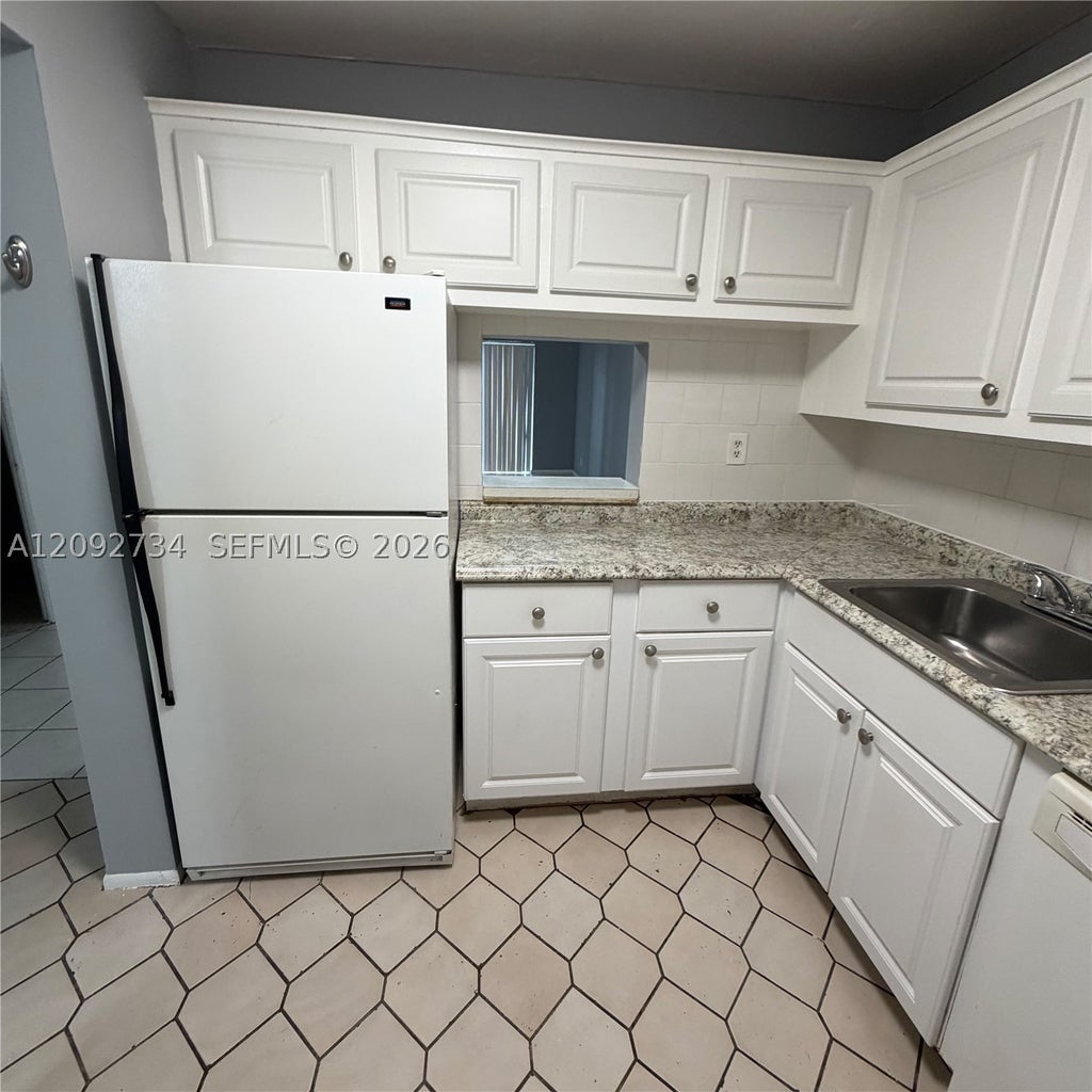 Photo of 7801 S Colony Cir S #105, Tamarac, FL 33321 (MLS # A12092734)