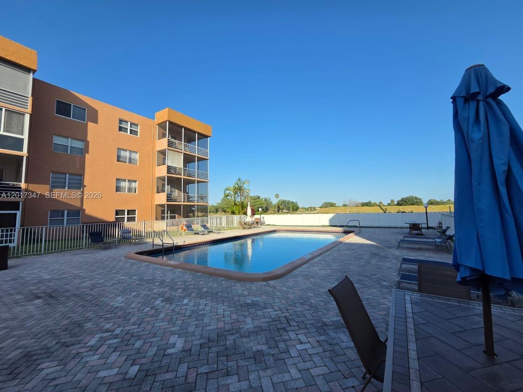 Photo of 3050 E Sunrise Lakes Dr #402, Sunrise, FL 33322 (MLS # A12017347)