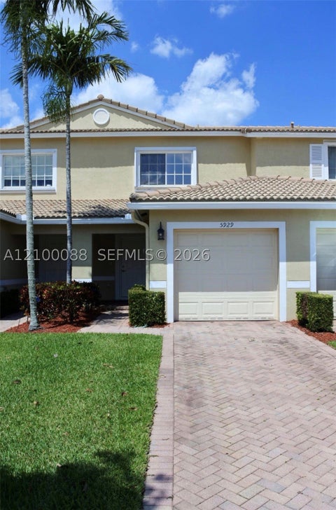 Photo of 5929 Royal Way #5929, Tamarac, FL 33321 (MLS # A12100088)