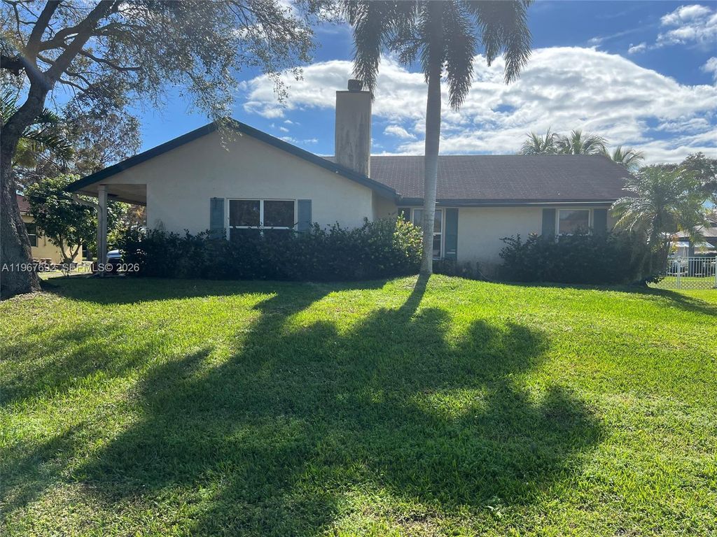 Photo of 11520 NW 26th St, Plantation, FL 33323 (MLS # A11967692)