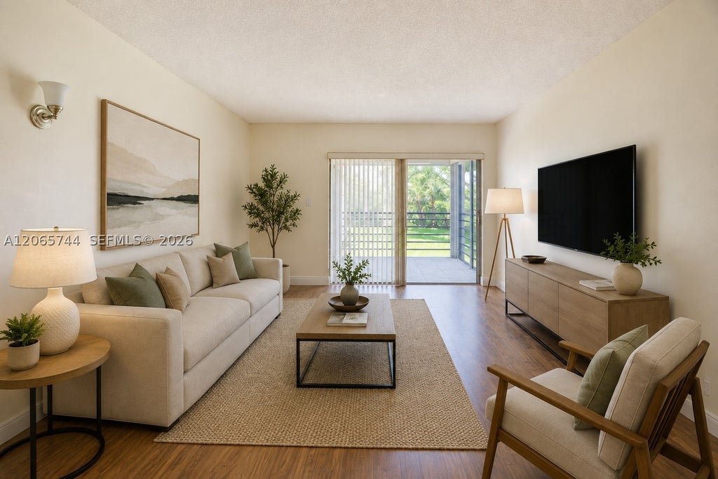 Photo of 9233 SW 8th St #208, Boca Raton, FL 33428 (MLS # A12065744)