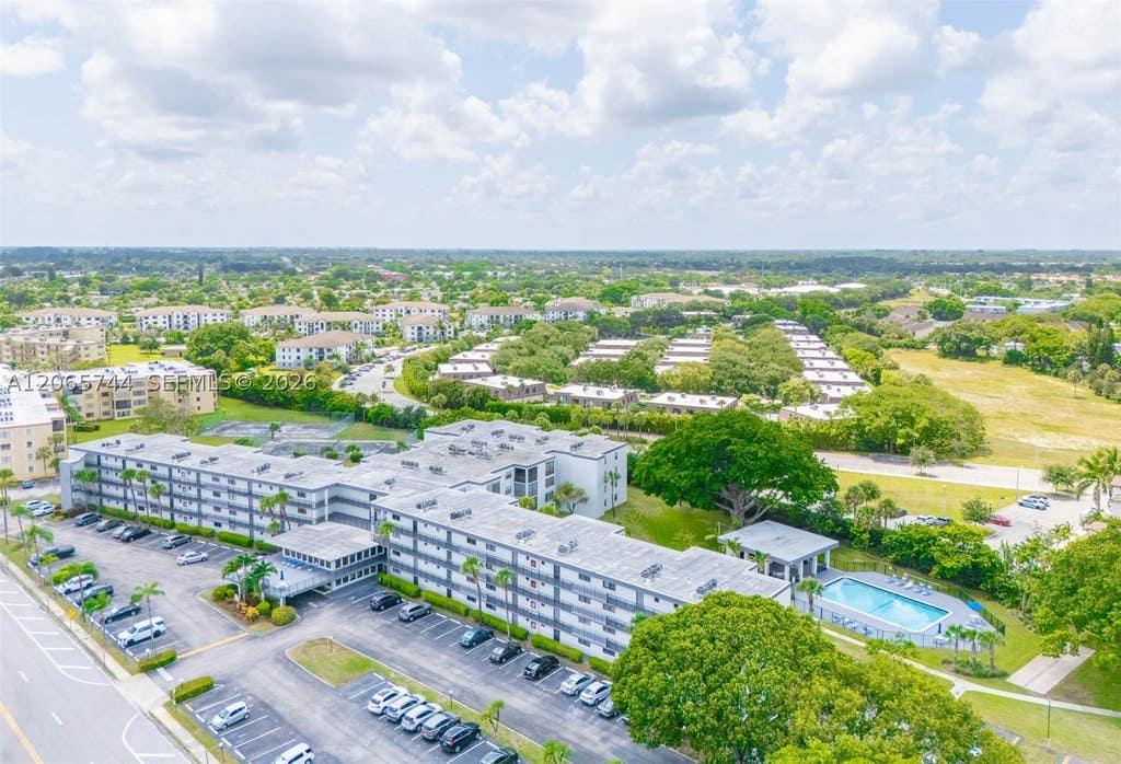 Photo of 9233 SW 8th St #208, Boca Raton, FL 33428 (MLS # A12065744)