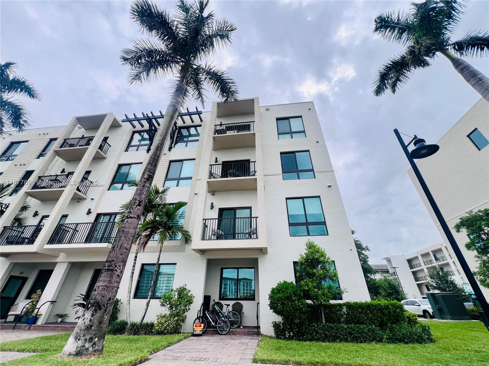 Townhouse-style corner condo in the heart of Downtown Doral with stunning lake views. This first-floor residence features 3 bedrooms, 2.5 bathrooms, an open layout, and a modern kitchen with stainless steel appliances. Enjoy abundant natural light and a contemporary urban setting. The Urbana community offers resort-style amenities including pool, tennis courts, BBQ/picnic area, playground, and more. Downtown Doral provides walkable access to dining, shopping, parks, and cultural events.