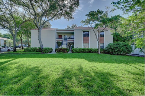 Photo of 9858 NW 3rd St #9858, Plantation, FL 33324 (MLS # A12049586)