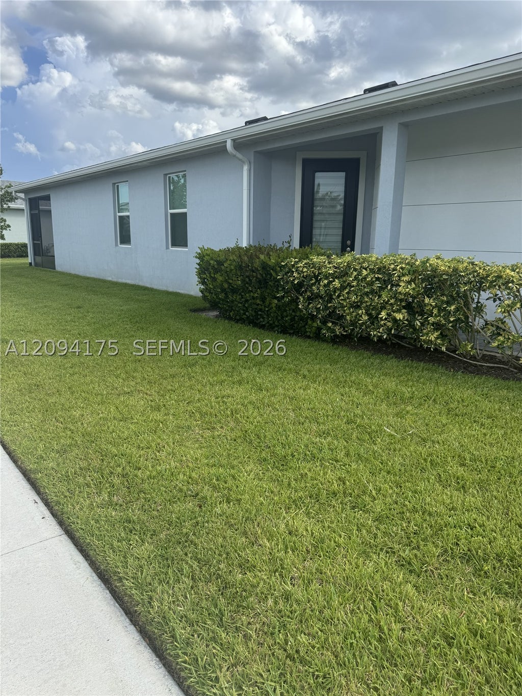Photo of 10639 SW Hensley St, Port St Lucie, FL 34987 (MLS # A12094175)