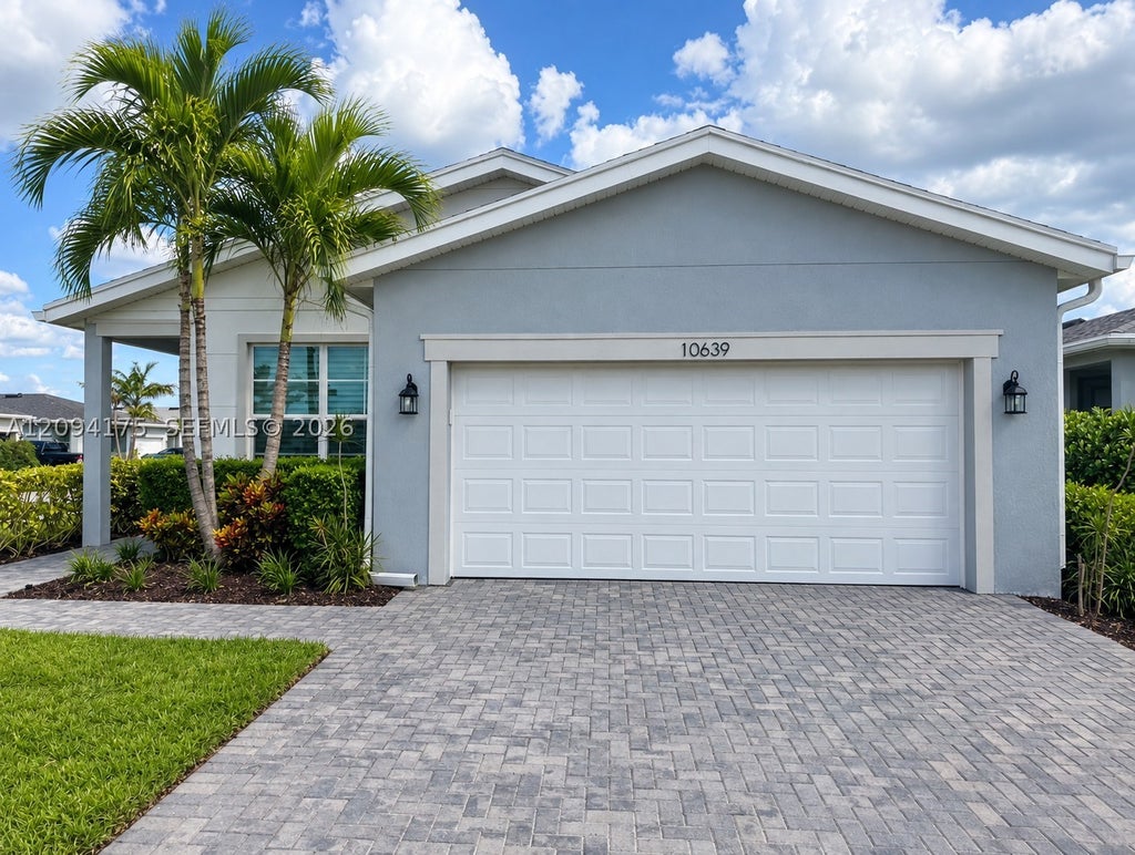 Photo of 10639 SW Hensley St, Port St Lucie, FL 34987 (MLS # A12094175)