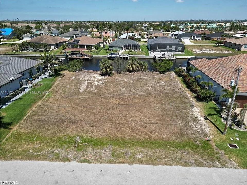 Discover the perfect location to build your dream home in Southwest Cape Coral, Florida. This oversized .36-acre vacant lot offers DIRECT sailboat water gulf access with no bridges and is situated in a neighborhood of newer homes. With its convenient location close to shopping, schools, parks, and restaurants, this lot provides the perfect balance of convenience and tranquility. Design and build the home of your dreams in a premium location with direct access to the Gulf. Don't miss out on the opportunity to make your dream home a reality. Contact us today to schedule a viewing, or just take a drive by and discover the limitless potential of this stunning vacant lot in one of the most desirable areas of Cape Coral!