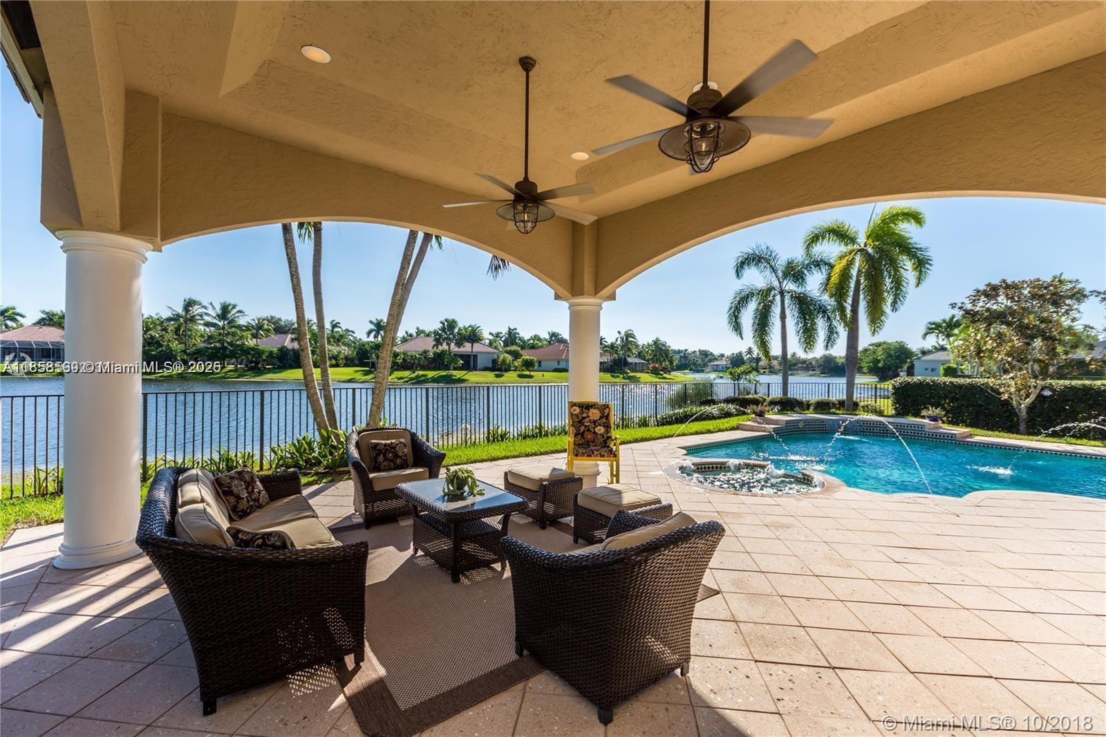 Enjoy your luxurious and beautiful home in the heart of Weston Hills Country Club featuring a private lakefront lot, which allows you to enjoy the breathtaking sunrise from the pool area. Pristine 5 bedrooms , 3 bathrooms , office + 3-car garage. A beautiful kitchen with top-of the-line appliances, granite countertops throughout the home, accordion shutters, remodeled bathrooms and more....
The expansive backyard includes a deck, pool and Jacuzzi perfect for entertaining. This home is in an excellent A+ school district with easy access to shop, fine dinging and major highways.
Schedule a showing and experience the luxury living.