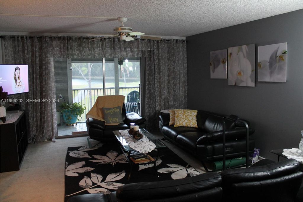 Photo of 12500 SW 6th St #202N, Pembroke Pines, FL 33027 (MLS # A11966202)