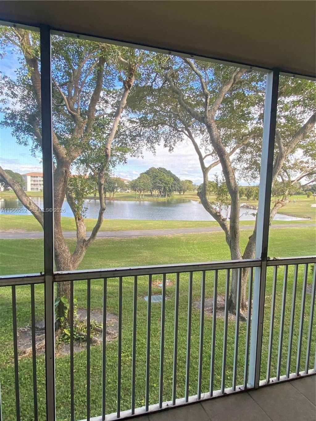 Photo of 12500 SW 6th St #202N, Pembroke Pines, FL 33027 (MLS # A11966202)