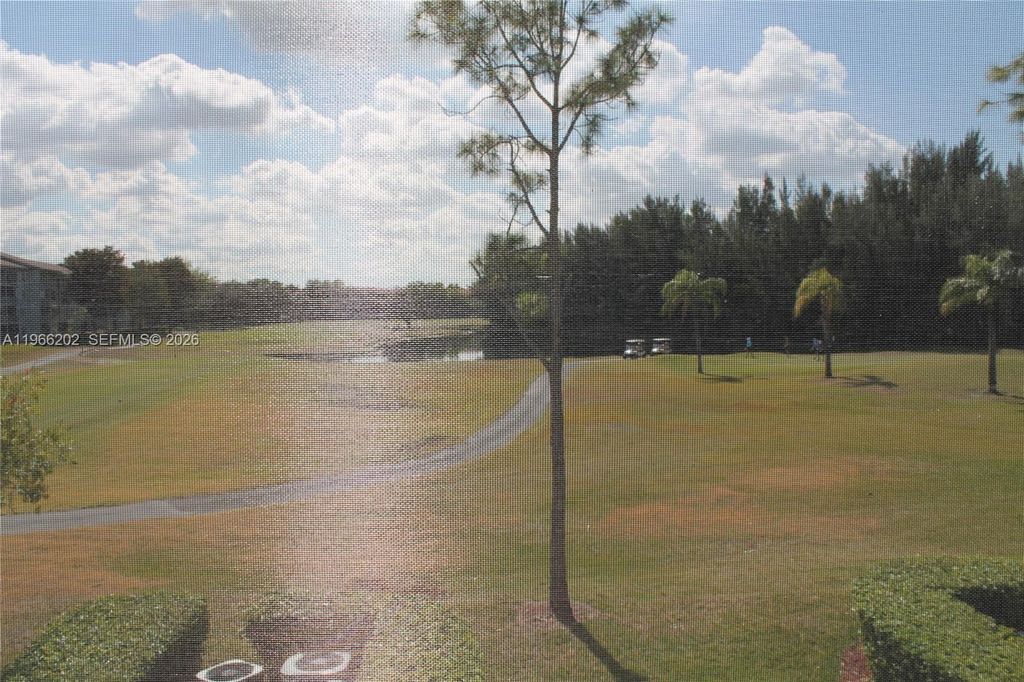 Photo of 12500 SW 6th St #202N, Pembroke Pines, FL 33027 (MLS # A11966202)