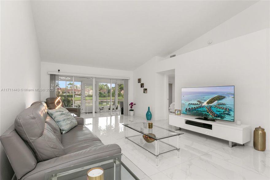 JUST REDUCED! Stunning 2 Bed 2 Bath villa on the lake with one car garage! Pristine! Shows like a model! Fully Remodeled! A must see! Private gem with the best lake view, Largest patio floor plan, Modern style Resort Style living, waterfall Quartz Countertops, Newer Paint, large porcelain tile floors throughout. Screened and Shuttered Florida room can be a bonus room leading out to lake front, paved patio and lush grassy backyard. Full Accordion shutters, Lawn, Roof, Exterior Maintenance and Insurance, Internet, Cable, Water and Alarm System ALL INCLUDED in Association payment! Worry-Free, Active adult community. Emerald Pointe features amenities such as a billiards Room, a heated pool, theater room, tennis courts, library, fitness center, pickle ball and much more! Come see for yourself !