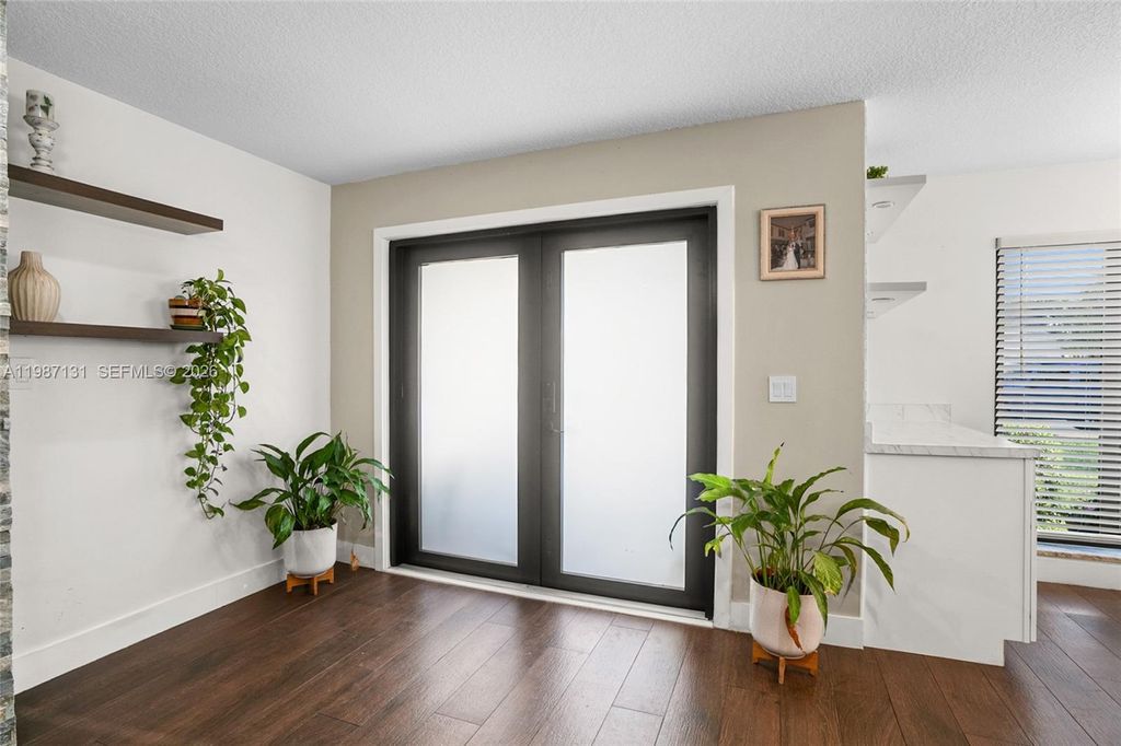 Photo of 9841 NW 24th St, Coral Springs, FL 33065 (MLS # A11987131)