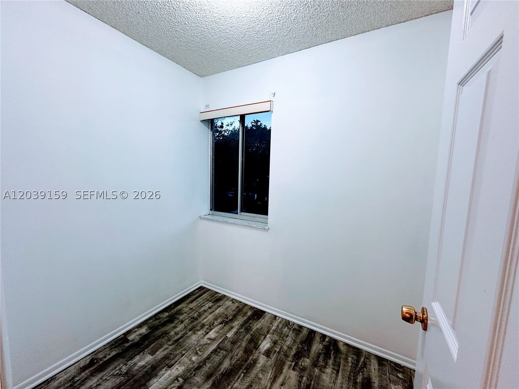 Photo of 107 Gardens Dr #205, Pompano Beach, FL 33069 (MLS # A12039159)