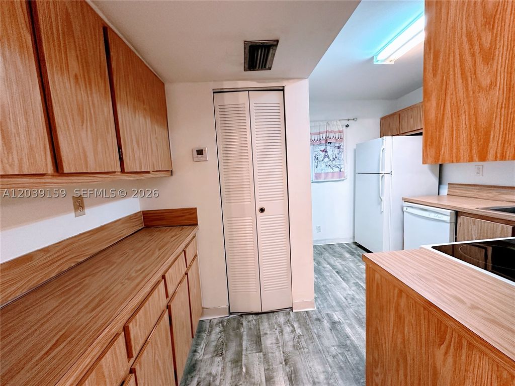Photo of 107 Gardens Dr #205, Pompano Beach, FL 33069 (MLS # A12039159)