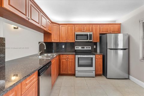 Photo of 9044 NW 28th Dr #3-107, Coral Springs, FL 33065 (MLS # A11890581)