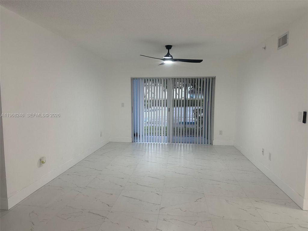 Photo of 2600 S University Dr #115, Davie, FL 33328 (MLS # A11968248)