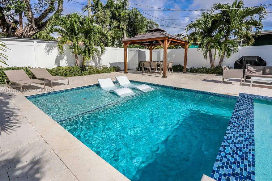 Elegant 3 bedrooms / 2 bathrooms. Magnificent location! Less than 5 min. to the Beach and 2 min. to Downtown Hollywood. Enjoy your private, fenced, resort-inspired backyard with a heated pool & jacuzzi, gazebo, and outdoor living spaces - perfect for entertaining. The nearby Atlantic Ocean, parks, and lakes, explore the vibrant downtown area for dining, shopping, and entertainment. The pool has lights and a Pantair pool system with a remote control. Also smart thermostat, Alexa, smart doorbell with camera, smart lights in the living room, and motion lights outside. Close to Fort Lauderdale-Hollywood Int'l Airport. Close to Houses of Worship.