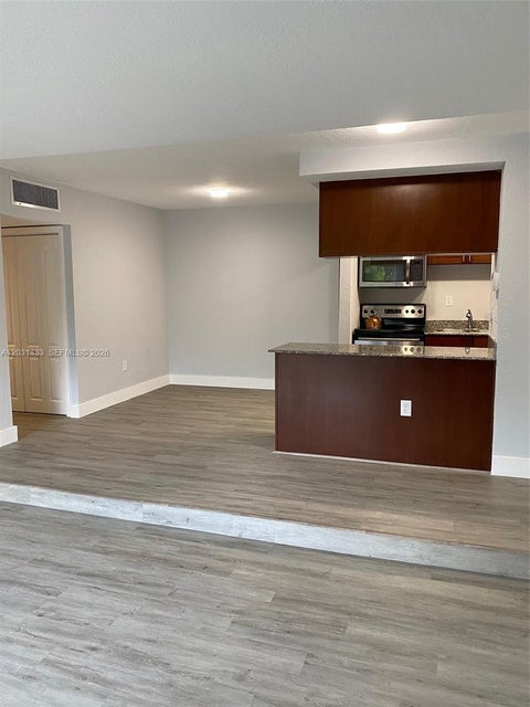 Photo of 8950 SW 69th Ct #308, Pinecrest, FL 33156 (MLS # A12031433)