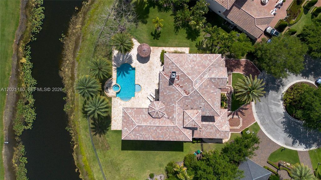 Photo of 7290 Lemon Grass Dr, Parkland, FL 33076 (MLS # A12021180)