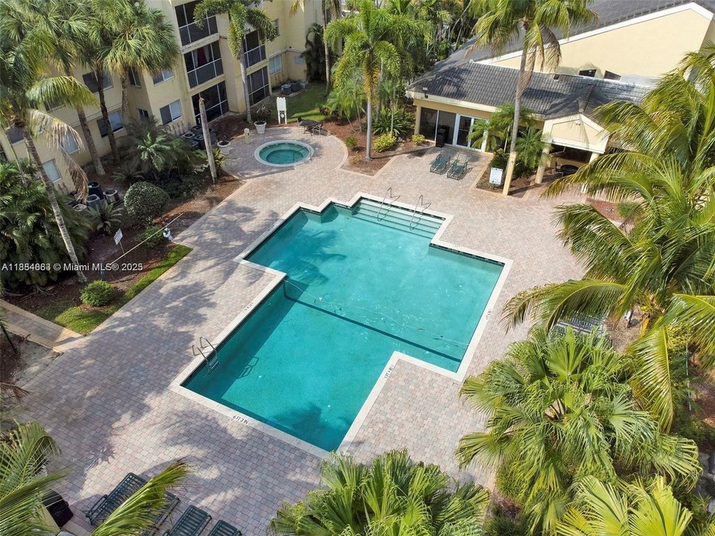 Photo of 5720 Rock Island Rd #396, Tamarac, FL 33319 (MLS # A11884863)