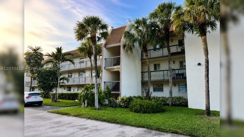 Photo of 7500 NW 17 St #107, Plantation, FL 33313 (MLS # A12070410)