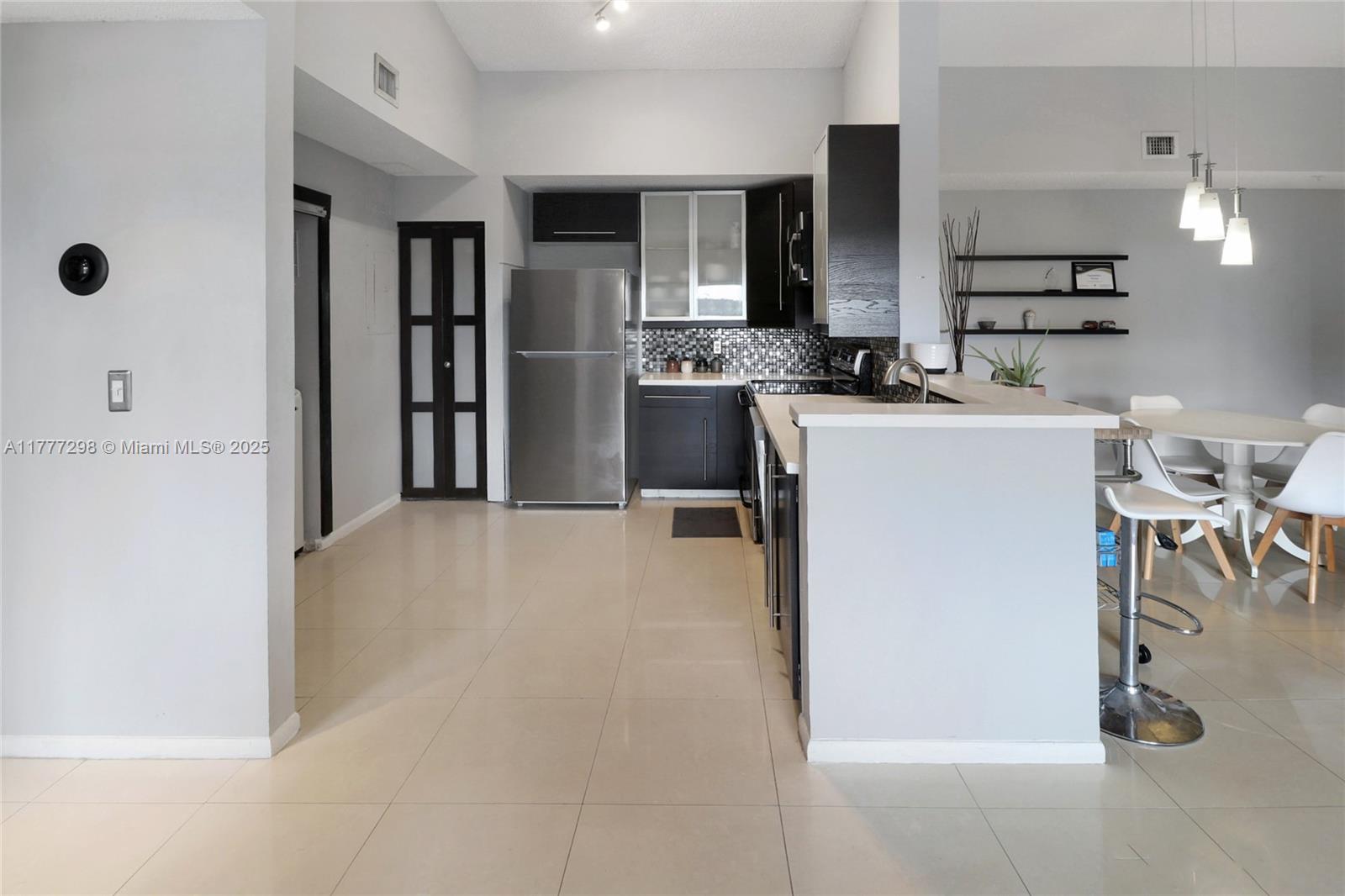 COURTYARDS AT DAVIE CONDO - Residential