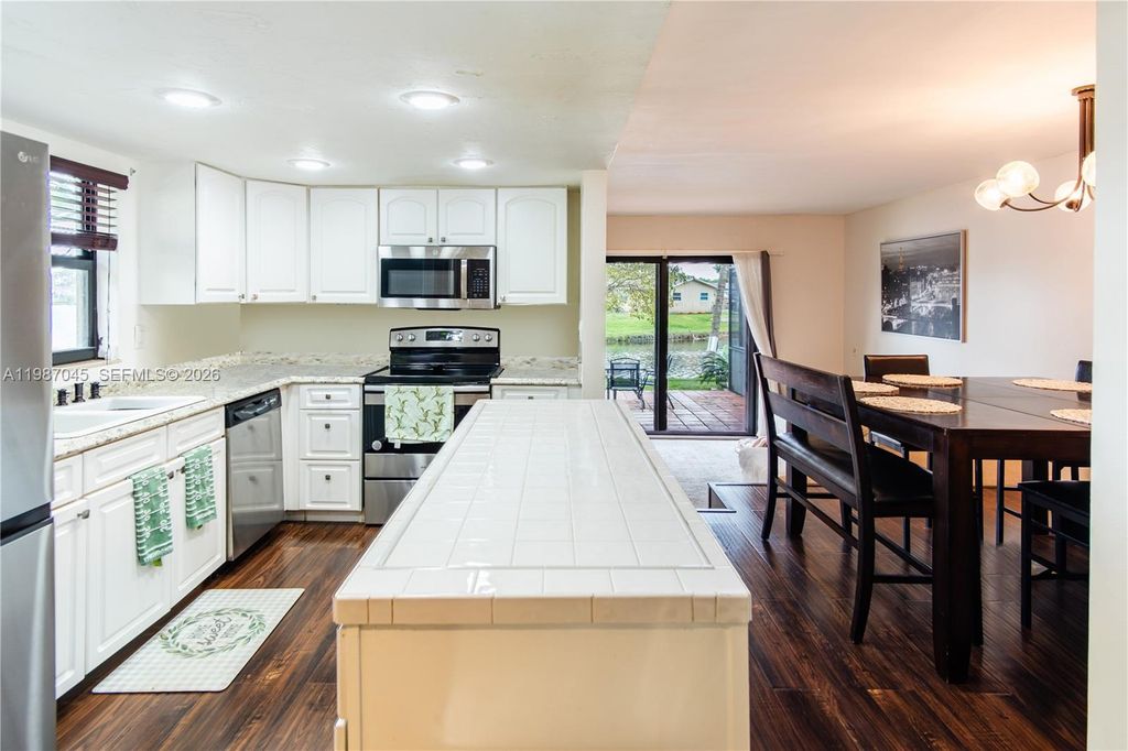 Photo of 8980 Palm Tree Ln #8980, Pembroke Pines, FL 33024 (MLS # A11987045)