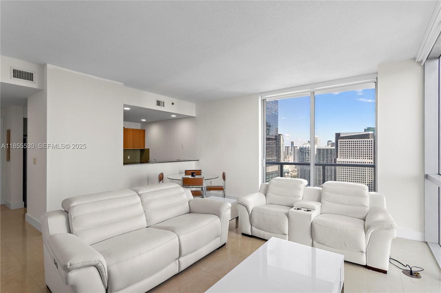 Presenting this super spacious 2 bedroom 2.5 bathroom unit on the 40th floor. This 1368sqft contemporary unit comes with 2 large bedrooms, Living room with 10 foot ceilings, perfect for entertaining guests. Enjoy amazing city views and amazing East/Southeast facing views of Biscayne Bay. Located on Brickell Ave in the Financial District, you’re a quick walk away from the office, the best restaurants, and the best nightlife in town! Perfect for a young professional who works in the area, or for an investor looking to make rental income, in one of Brickell’s fastest growing areas. Amenities include 24 hour security, valet parking, pool, gym, Golf-Simulator, a wine and cigar room, and much more! Washer/Dryer in-unit, 1 assigned parking. Live That Brickell Life Today! OWNER TO PAY ASSESSMENT!