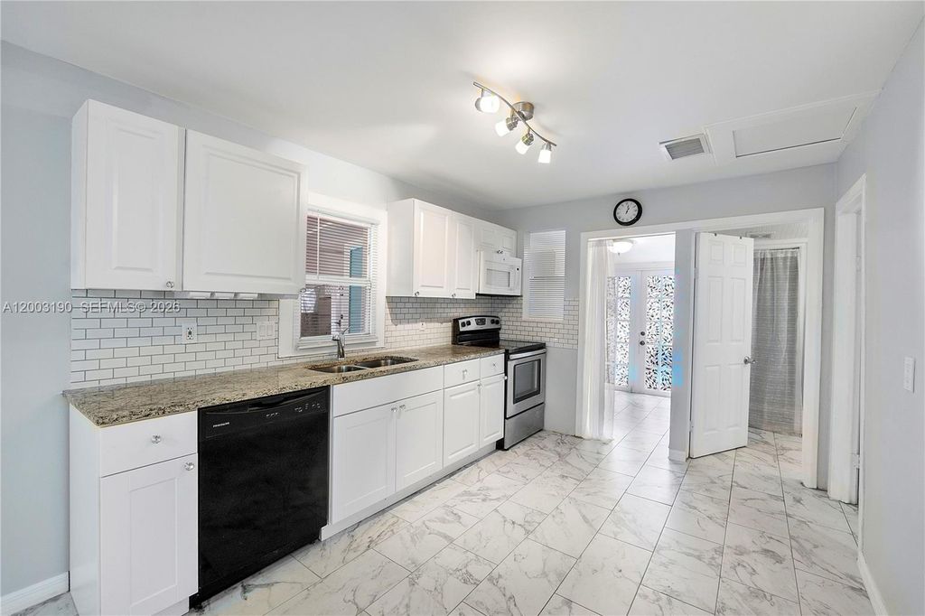 Photo of Oakland Park, FL 33334 (MLS # A12003190)