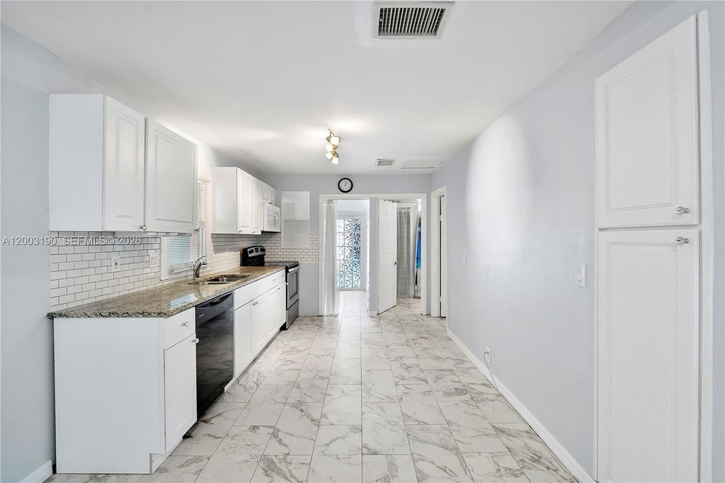 Photo of Oakland Park, FL 33334 (MLS # A12003190)