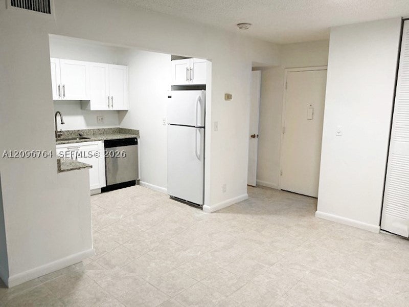 Photo of 2017 NW 46th Ave #A410, Lauderhill, FL 33313 (MLS # A12096764)
