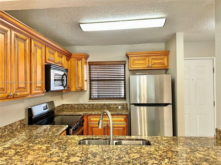 This spacious updated condo features 2 bedrooms and 2 bathrooms. The kitchen was updated with stainless steel
appliances, granite countertops, and custom cabinetry. The unit was freshly painted, and modern window
treatments installed ensuring a move-in-ready experience. The screened-in patio is perfect for enjoying the Florida
weather year-round. Community surrounded by an array of restaurants and shops. Don’t miss your chance to own
this property and experience the welcoming comfort and conveniences.